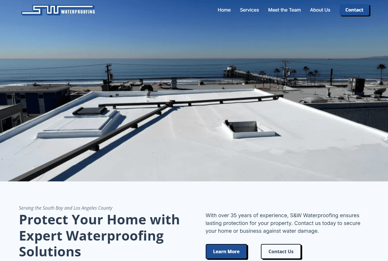 Flat white commercial rooftop with HVAC equipment and ocean view, from a waterproofing company website promoting their expert services.